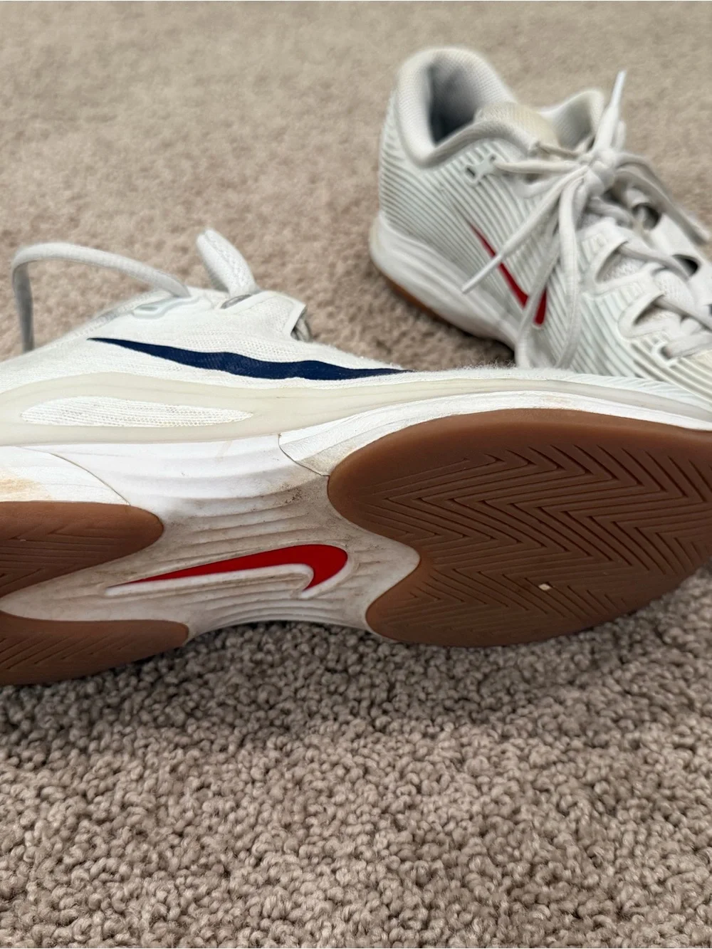 Nike White Sneakers with Navy Swoosh and Gum Outsole